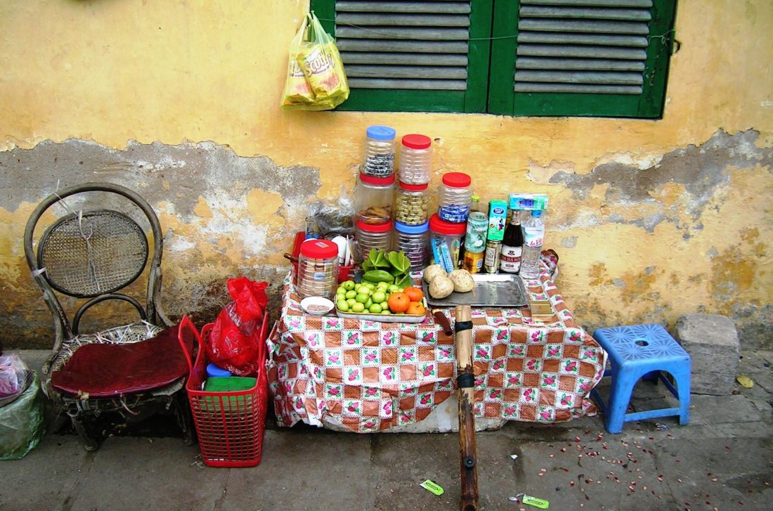 Long days, day after day, even the street vendor sometimes needs a break....time out in North Vietnam