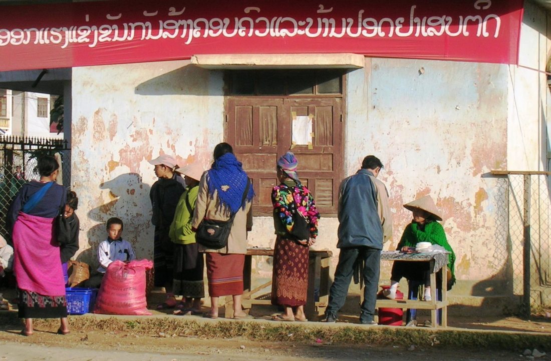 Selling lottery tickets in a village in the east of Laos. Even the poor cherish hopes for a big win.....