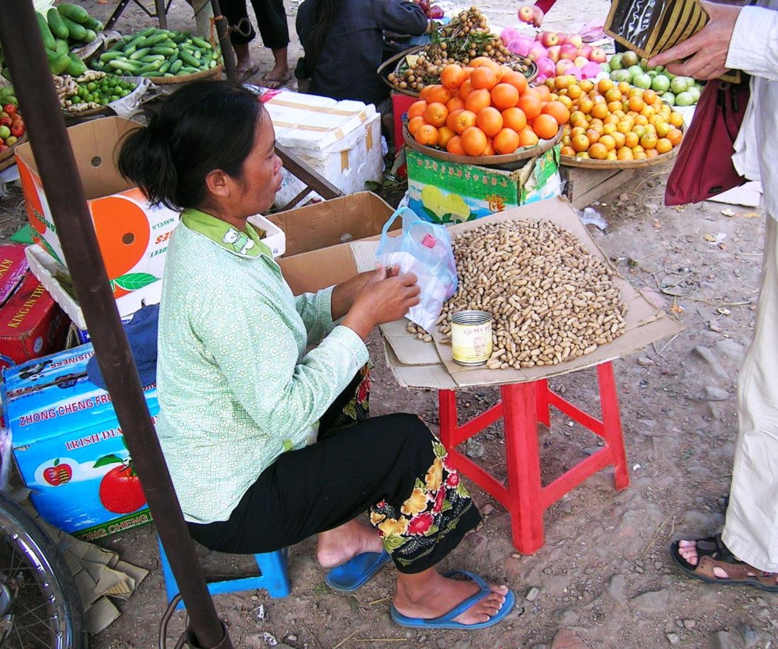 Selling peanuts on the streets of Phnom Pen - and earning peanuts too....